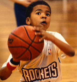 Tykeem D'Majh Franklin playing basketball as a young player